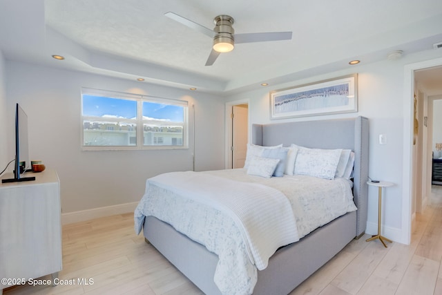 bedroom with a ceiling fan, recessed lighting, baseboards, and light wood finished floors