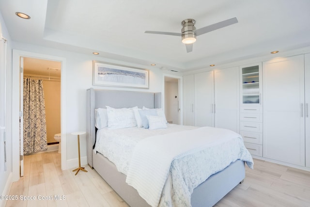 bedroom with recessed lighting, a ceiling fan, and light wood finished floors