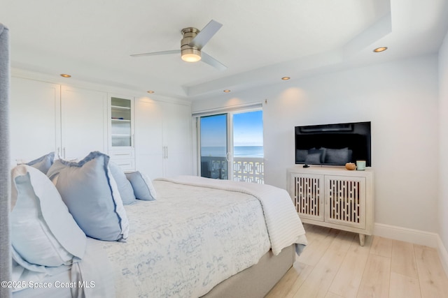 bedroom featuring recessed lighting, light wood-type flooring, baseboards, and a ceiling fan