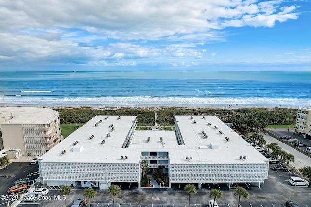 bird's eye view with a view of the beach and a water view