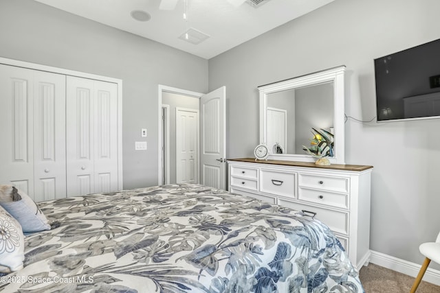 carpeted bedroom with a ceiling fan, baseboards, and a closet