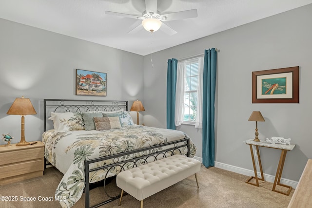 bedroom with carpet, baseboards, and ceiling fan