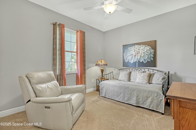 bedroom with baseboards, carpet, and a ceiling fan