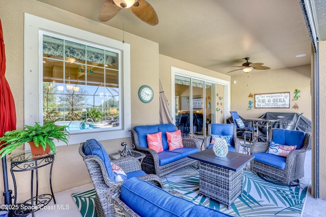 view of patio / terrace with an outdoor living space and ceiling fan