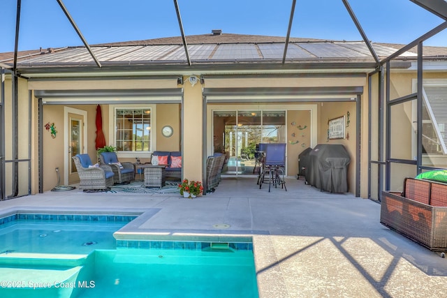 back of property featuring a lanai, an outdoor living space, an outdoor pool, and a patio