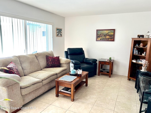 living area with light tile patterned floors