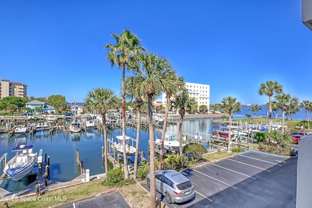 exterior space featuring a water view and boat lift