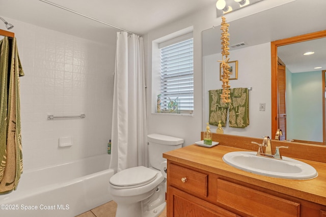 full bathroom with vanity, visible vents, tile patterned flooring, toilet, and shower / tub combo with curtain