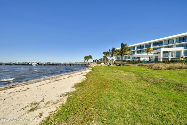 view of water feature with a beach view