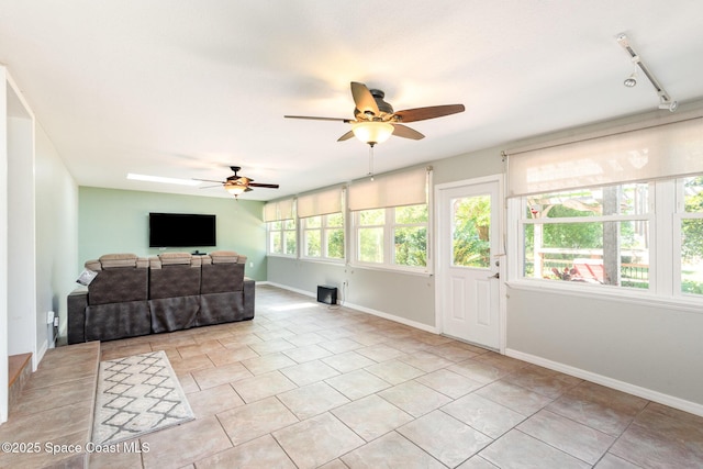 3530 Alan Dr, Titusville, FL 32780 - sunroom / solarium featuring track lighting and a ceiling fan