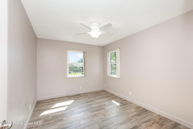 3530 Alan Dr, Titusville, FL 32780 - spare room featuring ceiling fan, baseboards, and light wood-style flooring