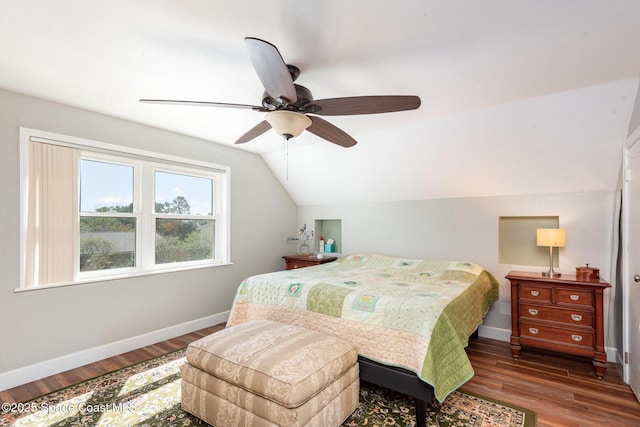 3530 Alan Dr, Titusville, FL 32780 - bedroom with baseboards, lofted ceiling, wood finished floors, and a ceiling fan