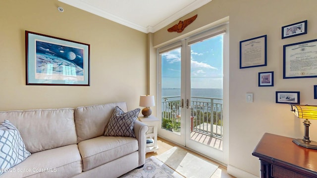 living room with french doors and ornamental molding