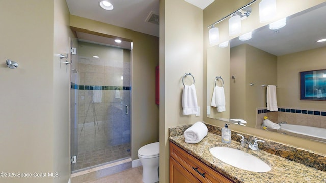 bathroom featuring visible vents, toilet, a stall shower, tile patterned floors, and vanity