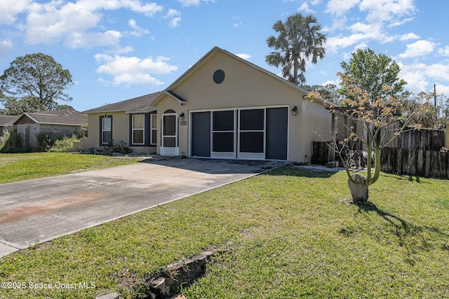 ranch-style house with concrete driveway, an attached garage, a front yard, and stucco siding