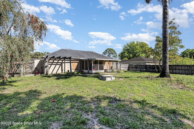 view of yard with a fenced backyard