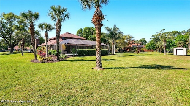 view of yard with a lanai