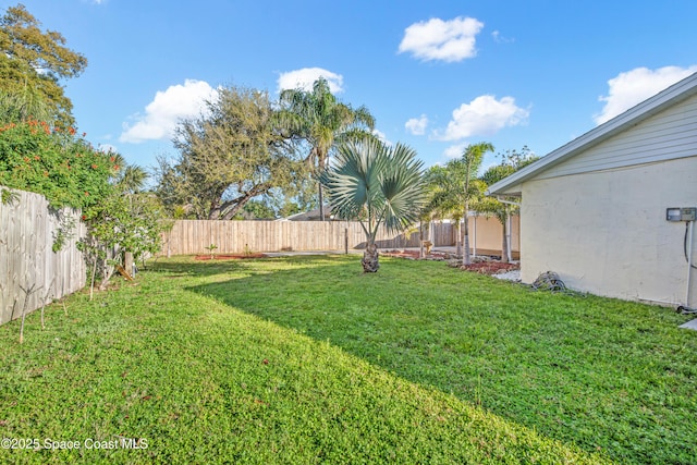 view of yard featuring a fenced backyard