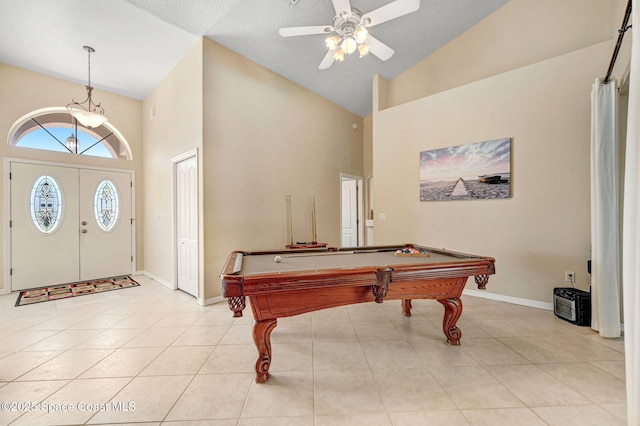 recreation room with high vaulted ceiling, a ceiling fan, billiards, light tile patterned floors, and baseboards