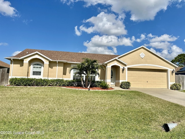 view of front facade featuring a garage, concrete driveway, a front yard, and stucco siding