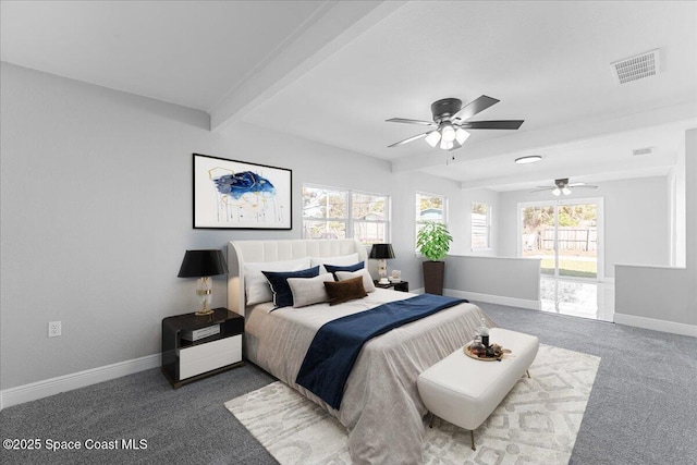 bedroom featuring visible vents, baseboards, carpet, and beamed ceiling