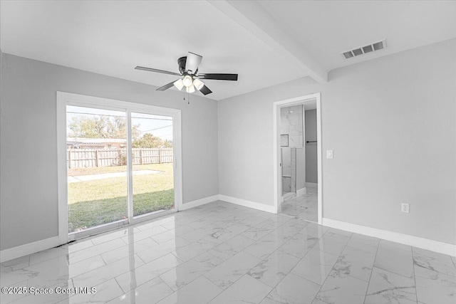 unfurnished room with visible vents, baseboards, and marble finish floor