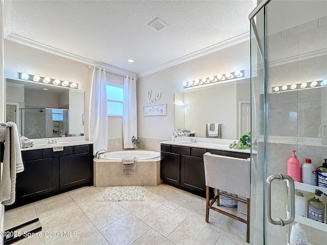 full bath with visible vents, a textured ceiling, a shower stall, and crown molding