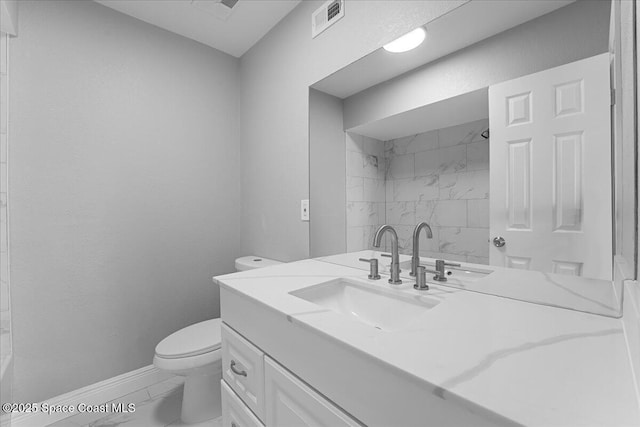 full bathroom with visible vents, baseboards, toilet, marble finish floor, and vanity