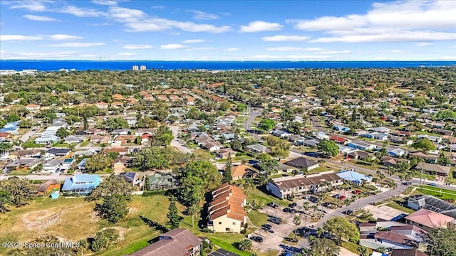 aerial view featuring a residential view and a water view