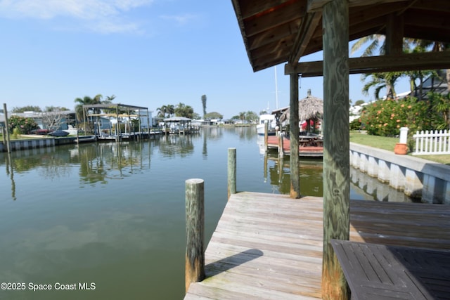 dock area featuring a water view