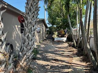 view of side of property featuring stucco siding