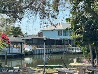 dock area featuring a water view