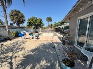 view of patio with a fenced backyard