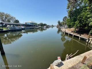 view of dock with a water view