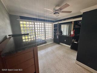 bedroom featuring carpet floors, baseboards, and ornamental molding