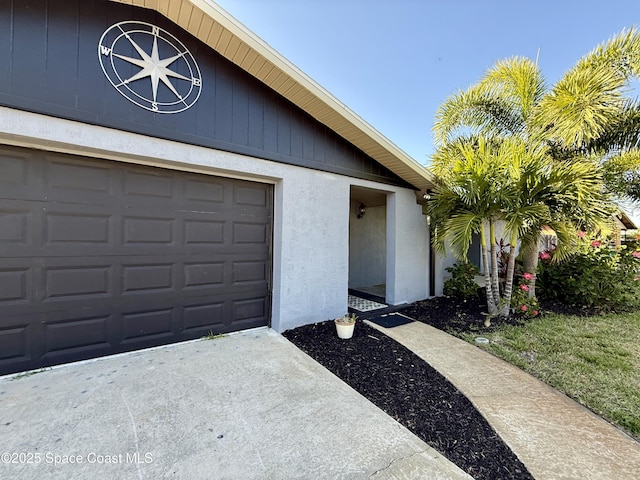 garage featuring driveway