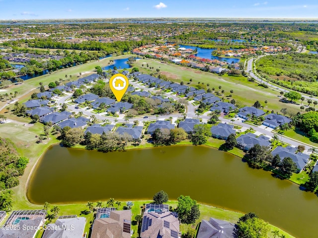 bird's eye view featuring a residential view and a water view