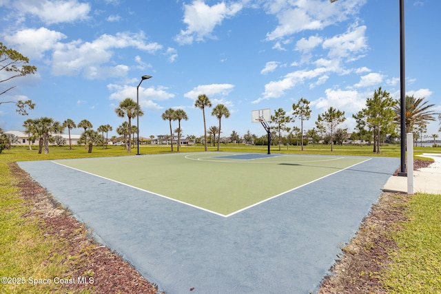 4722 Tennyson Dr, Rockledge, FL 32955 - view of sport court with community basketball court and a lawn