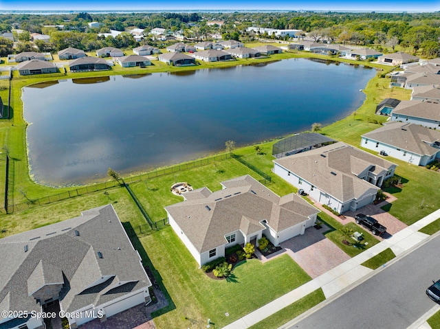 bird's eye view with a residential view and a water view