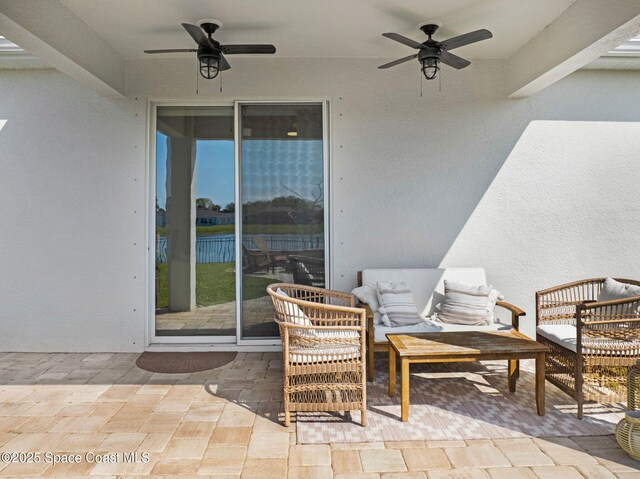 view of patio featuring a ceiling fan