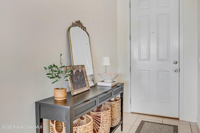 foyer featuring light tile patterned floors