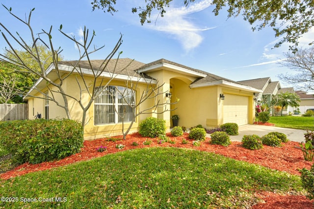 ranch-style house with a front yard, roof with shingles, stucco siding, a garage, and driveway