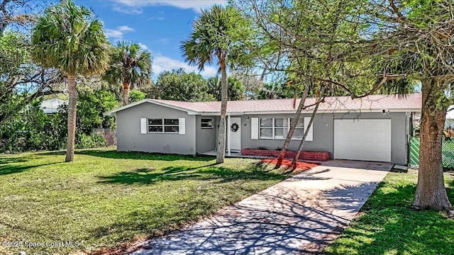 ranch-style home featuring fence, an attached garage, stucco siding, concrete driveway, and a front lawn