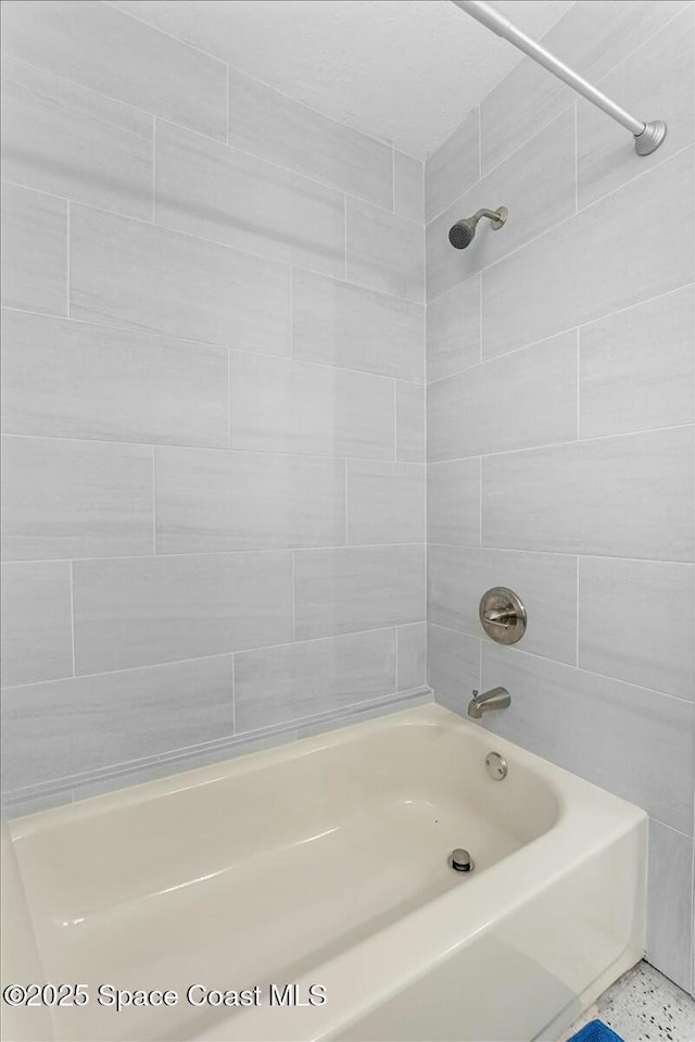 full bath featuring shower / bathtub combination