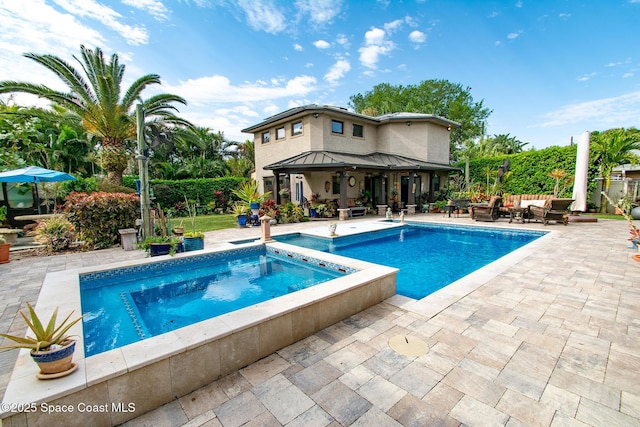 view of pool featuring outdoor lounge area, fence, a patio area, and a fenced in pool