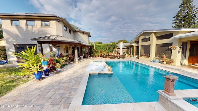 pool with a patio