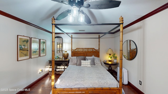 bedroom featuring dark wood-type flooring, baseboards, visible vents, and ornamental molding