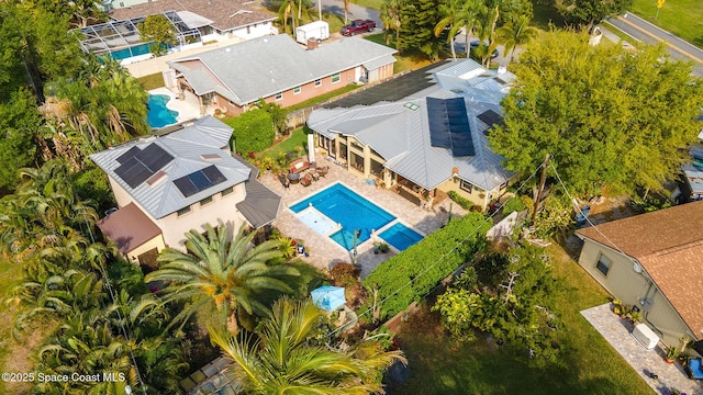 birds eye view of property with a residential view