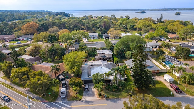 bird's eye view featuring a residential view and a water view