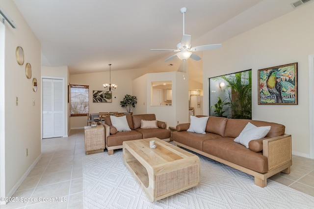 living room with light tile patterned floors, visible vents, baseboards, lofted ceiling, and ceiling fan with notable chandelier